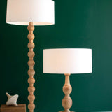 Carved Wooden Floor Lamp with Off-White Barrel Shade