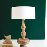 Carved Wooden Table Lamp with Off-White Barrel Shade